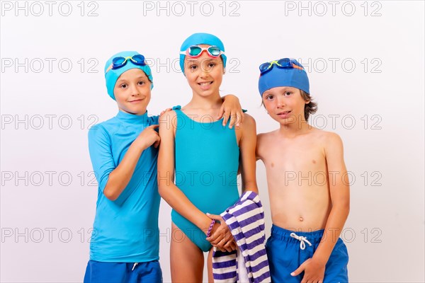 Children dressed in swimsuits for swimming lessons in the pool. White background