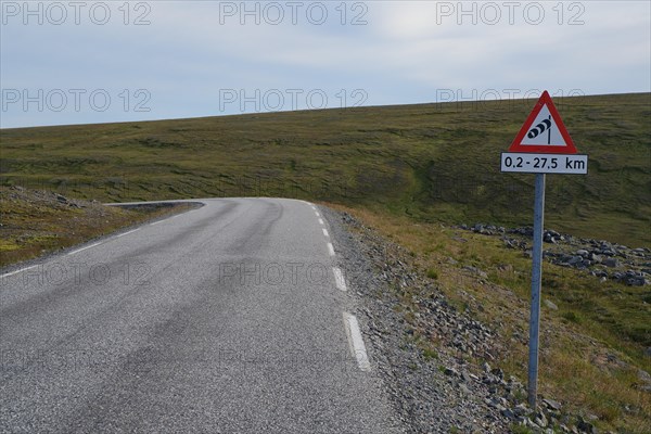 Signpost warning of wind gusts on the island of Mageroya