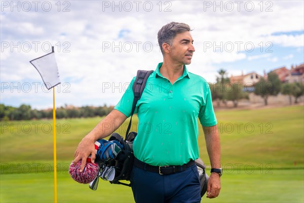 A professional golf player on a golf course