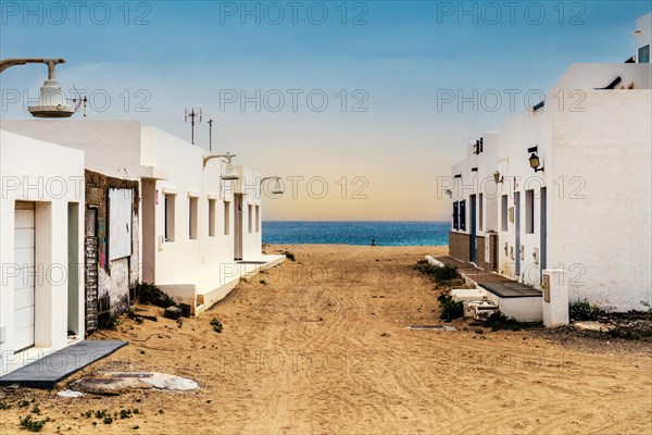 Sandy streets and white houses in Caleta del Sebo