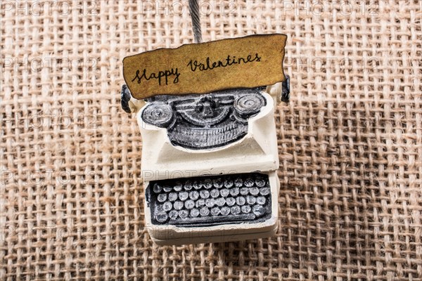 Valentine's day wording on torn typewriter as Love concept