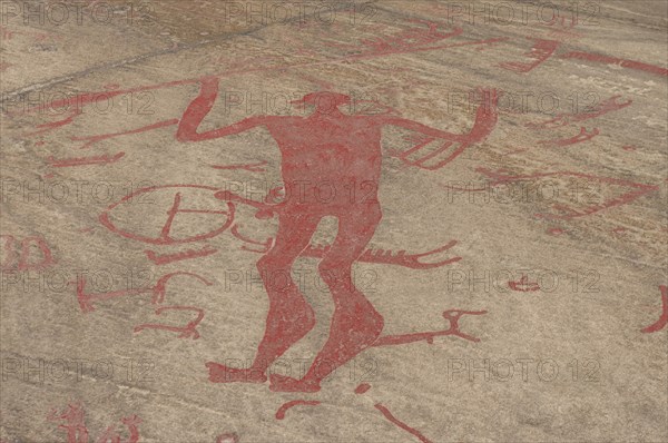 Rock carvings with figures