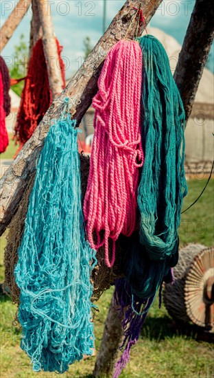 Natural wool thread dyed in color for carpet making