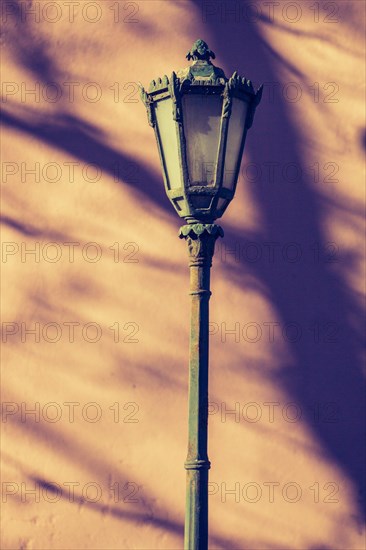 Old electric street lamps made of metal in retro style