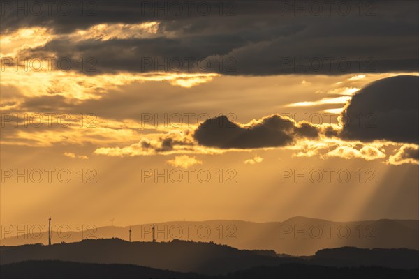 Wind turbines on the mountains of the Black Forest at dawn. Freiburg brisgau