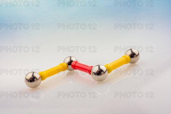 Magnet toy bars and magnetic balls on a white background