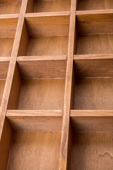 Close up of a wooden box with compartments