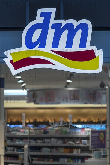 Company logo of the drugstore chain dm