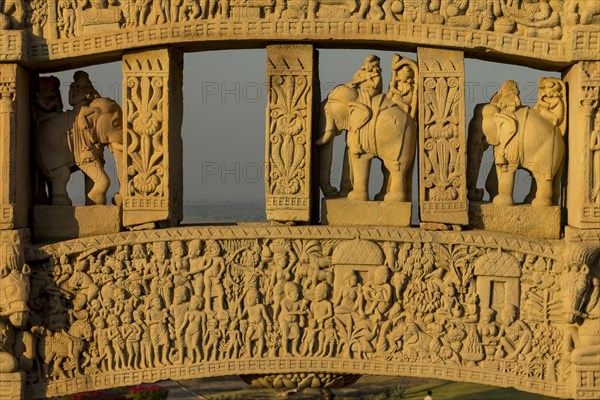 Detailed carvings including images of scanes from the Buddhas life. North Torana