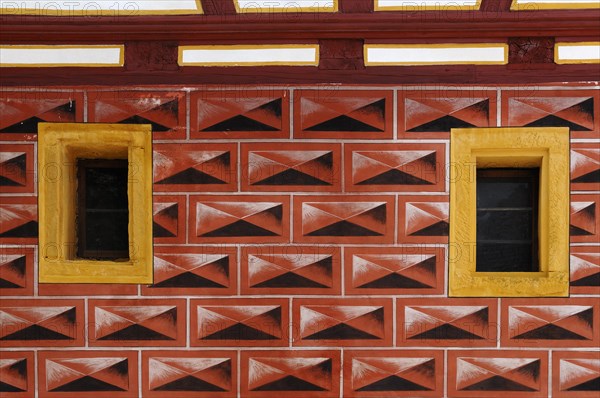 Painted masonry with two windows at the Schultheissenhof