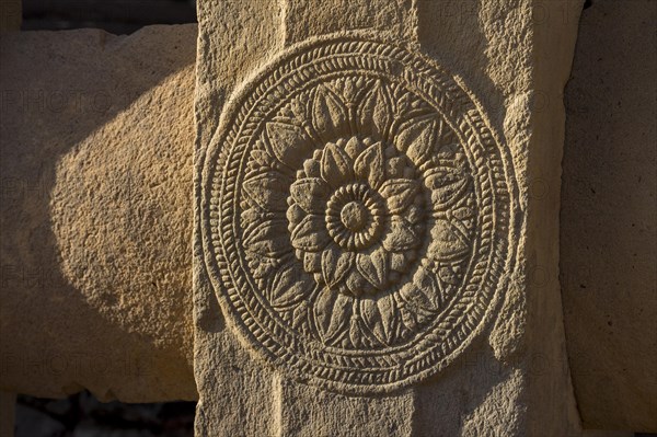 A carved medallion