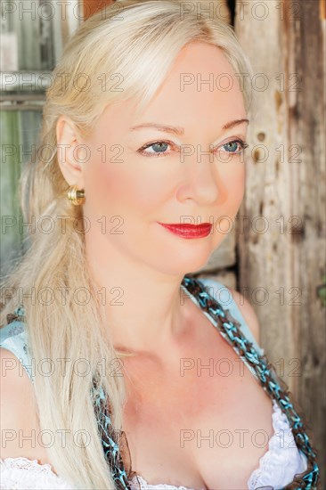 Portrait of a Blonde Woman in Dirndl