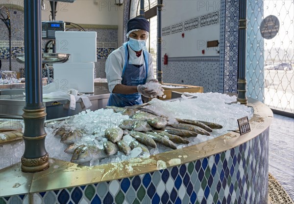 Salesman with sherry fish