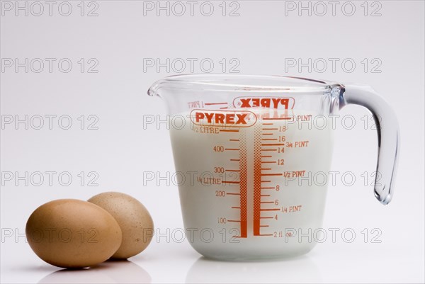 Jug of milk and two eggs