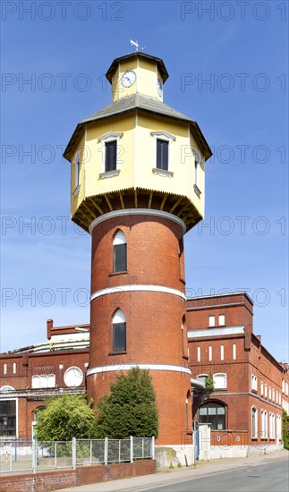 Factory facilities and water tower of the Homann Feinkost food factory