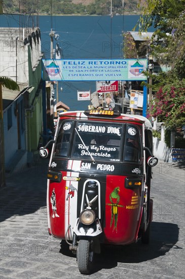 Red tuk tuk taxi