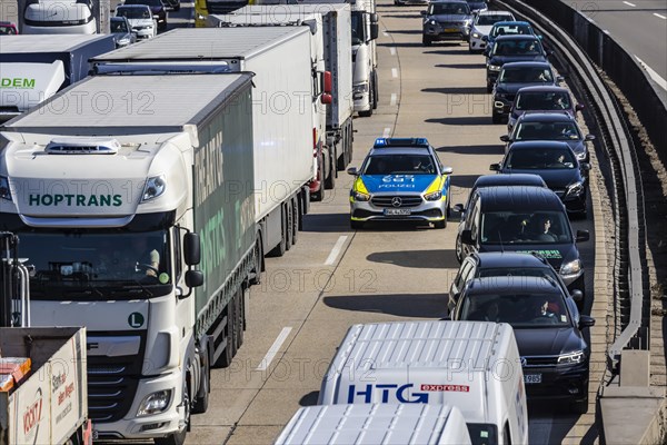 A8 motorway with heavy traffic of cars and trucks