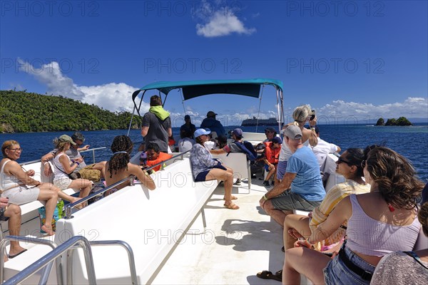 Tourists on a whale watching boat