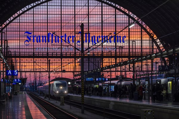 Main station with arriving ICE of Deutsche Bahn AG