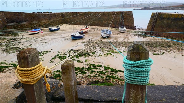 Fishing boat in the harbour of Port Racine in the Manche department