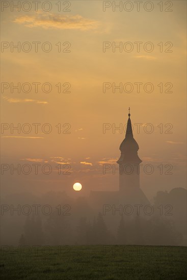 Sunrise in Rottenbuch behind the Church of the Nativity of the Virgin Mary