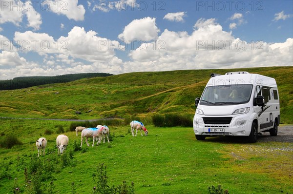 Camper van in a car park in the Yorkshire Dales
