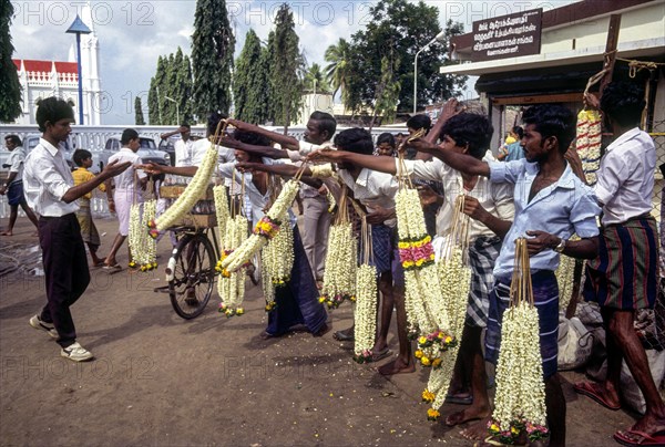 Compete for sale of garlands in front of Basilica of Our Lady of Good Health at Velankanni Velanganni on the shores of the Bay of Bengal