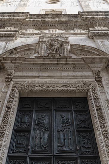 Relief of skeletons on the portal of the Chiesa Rettoria Santa Maria del Suffragio