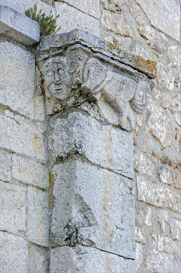 Relief on capital of a pilaster with representation of man and animals