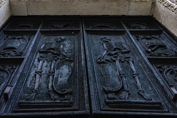 Relief of skeletons on the portal of the Chiesa Rettoria Santa Maria del Suffragio