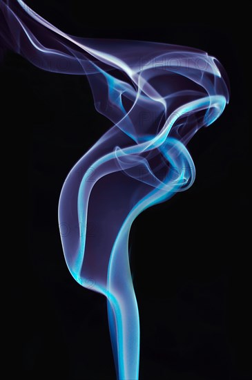 Rising smoke from an incense stick