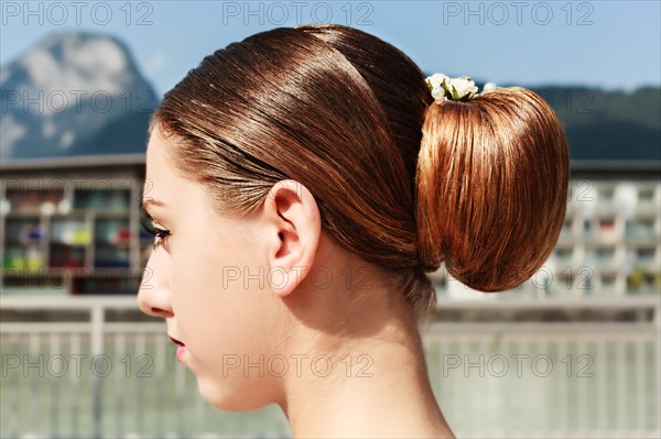 Chignon with small white florets