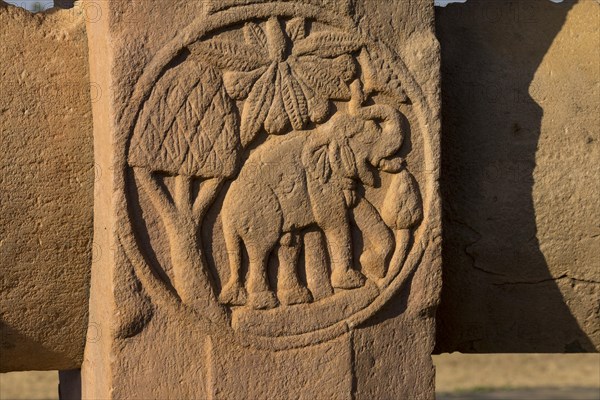 Round motif depicting an elephant. Detailed decorative carving on the balustrade of Stupa 2. Buddhist Monuments at Sanchi. UNESCO World Heritage Site. Sanchi