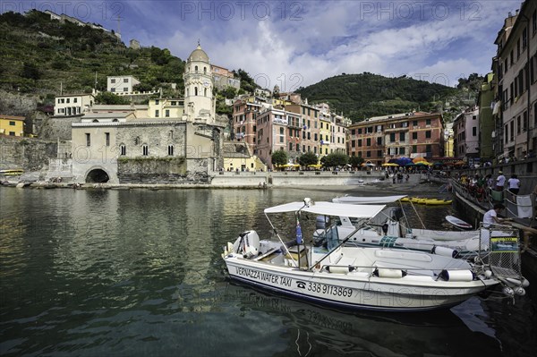 Water taxi at Vernazza with view of Church of Santa Margherita dAntiochia