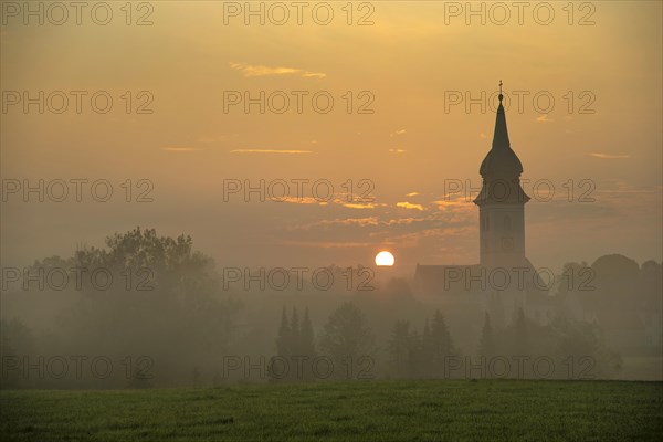Sunrise in Rottenbuch behind the Church of the Nativity of the Virgin Mary