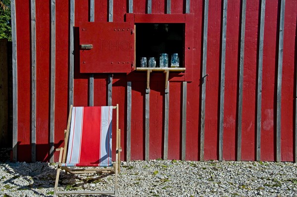 Deck chair in front of a restaurant in an allotment garden colony