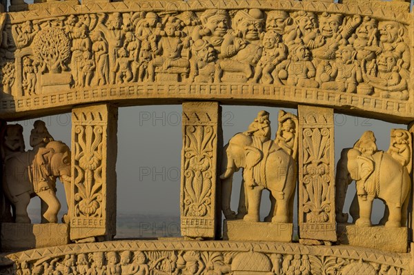 Detailed carvings including images of scanes from the Buddhas life. North Torana