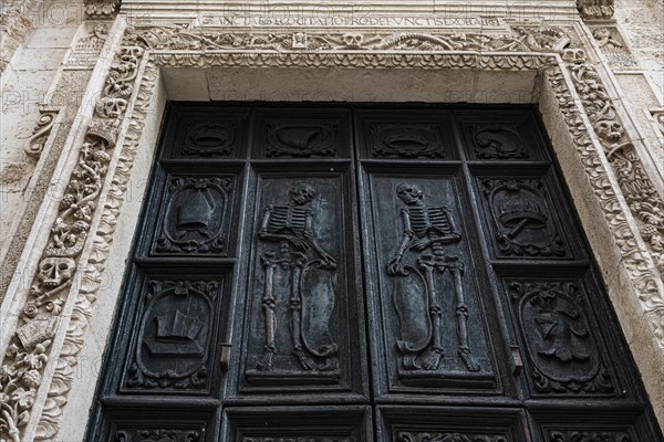 Relief of skeletons on the portal of the Chiesa Rettoria Santa Maria del Suffragio