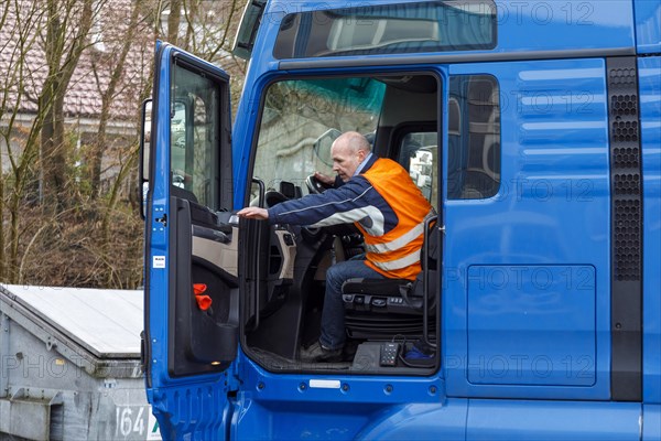 Professional driver in the drivers cab