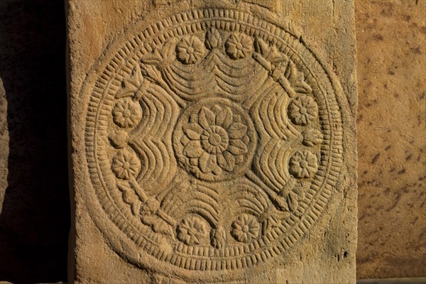 A carved medallion