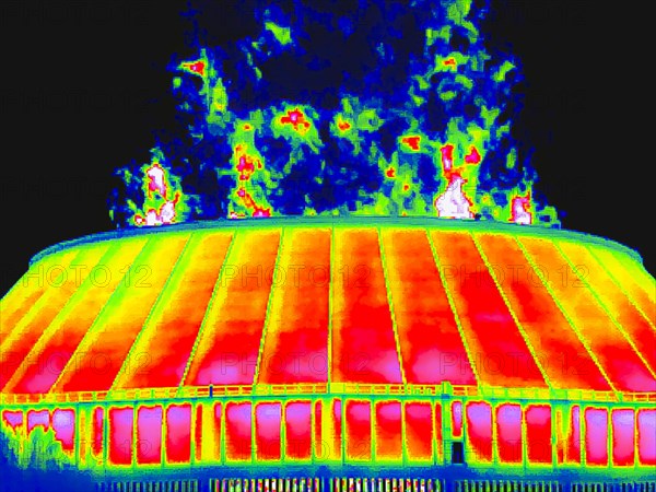 Water vapour rises from the cooling tower