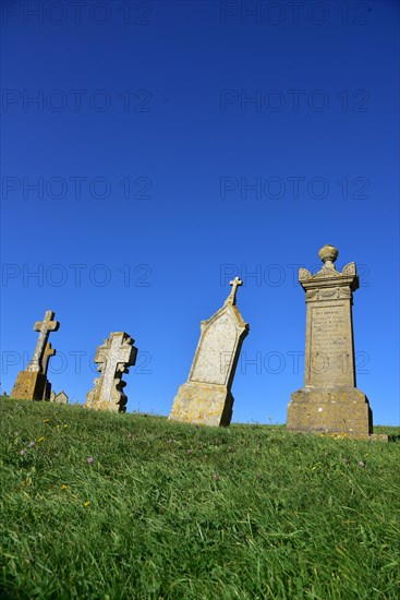 Gravestones in a cemetery in Normandy