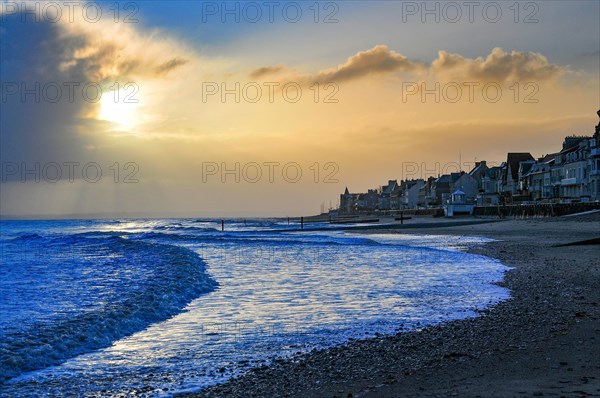 The beach of Saint-Aubin-sur-Mer in the department of Calvados in Normandy at sunrise