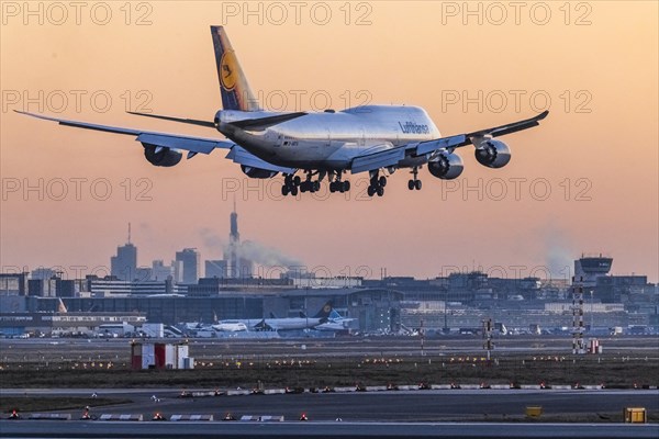 Fraport Airport with aircraft of type Boeing 747 Jumbo Jet of the airline Lufthansa during landing