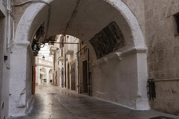 Archway over alley in Monopoli