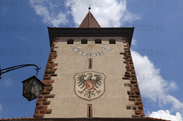 Upper gate of the Haigerach Gate from the 17th century with the town coat of arms and sundial