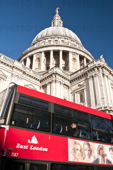 St. Pauls Cathedral with a red London tour bus