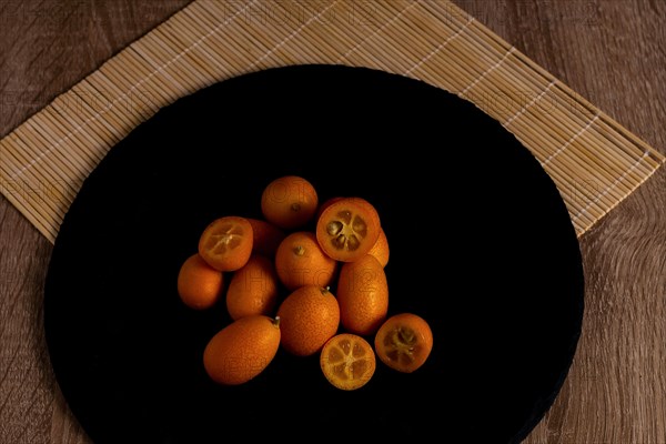 Close-up of small Chinese oranges