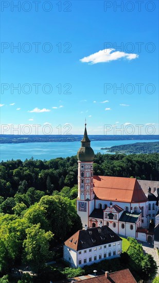 Aerial view of Andechs Monastery with the Lake Ammer lake in the background. Andechs