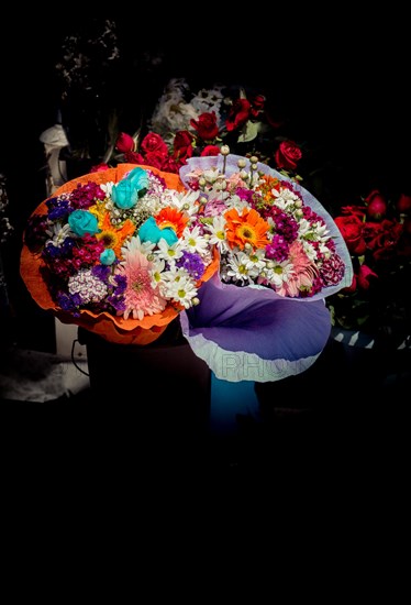 Fresh colorful Flowers put in vases at the florists